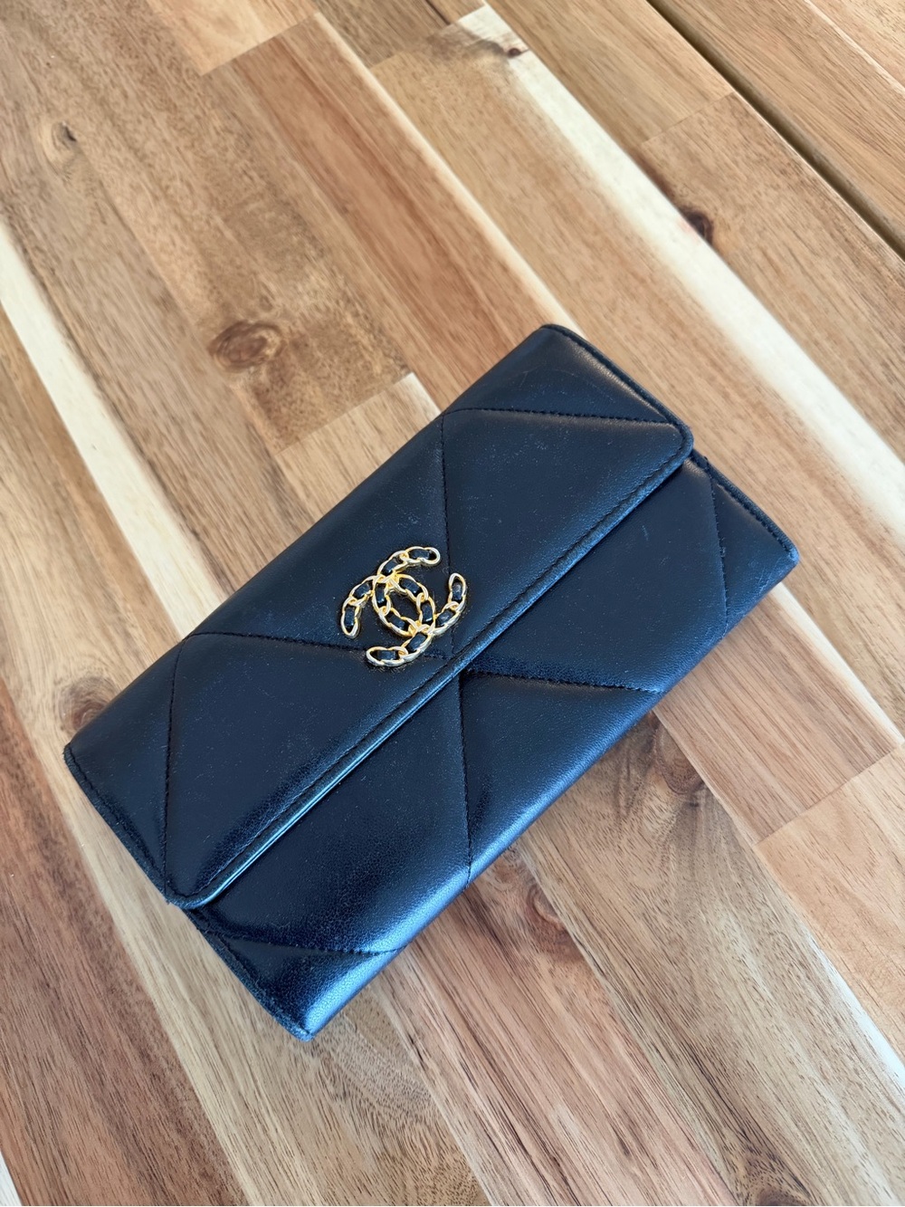 CHANEL Black Quilted Leather Wallet with Gold Hardware